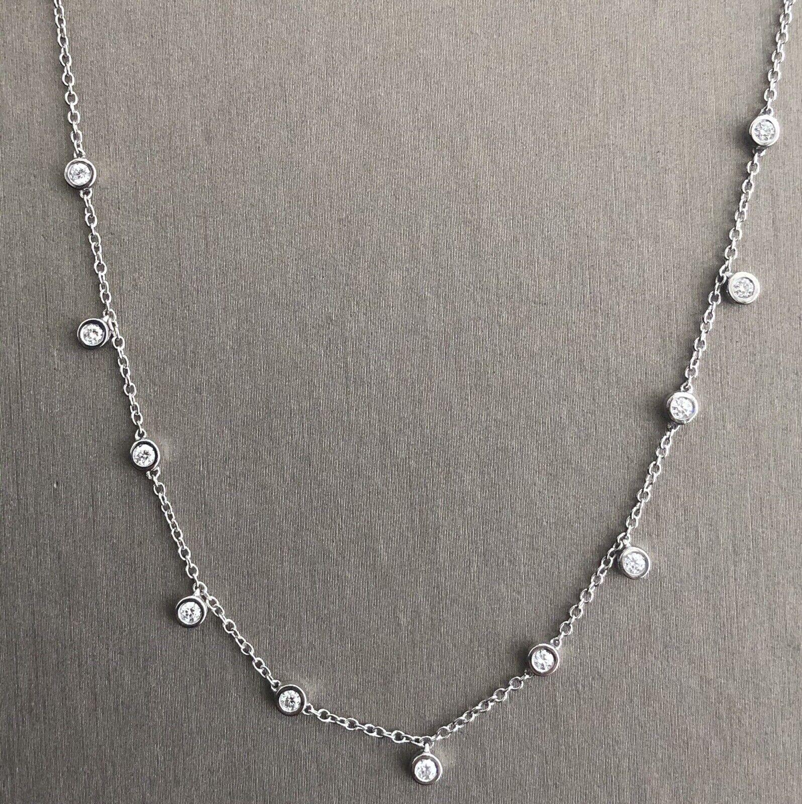 High jewellery designer piece right from heart of London Hatton Garden

18 inch long chain fully embellished with SI+/VS clarity sparkling solitaire station diamonds totalling 0.33ct

Fully Hallmarked with 750

Breathtaking

Please study pics for