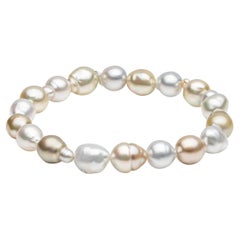 Bracelet élastique baroque des mers du Sud en or et blanc