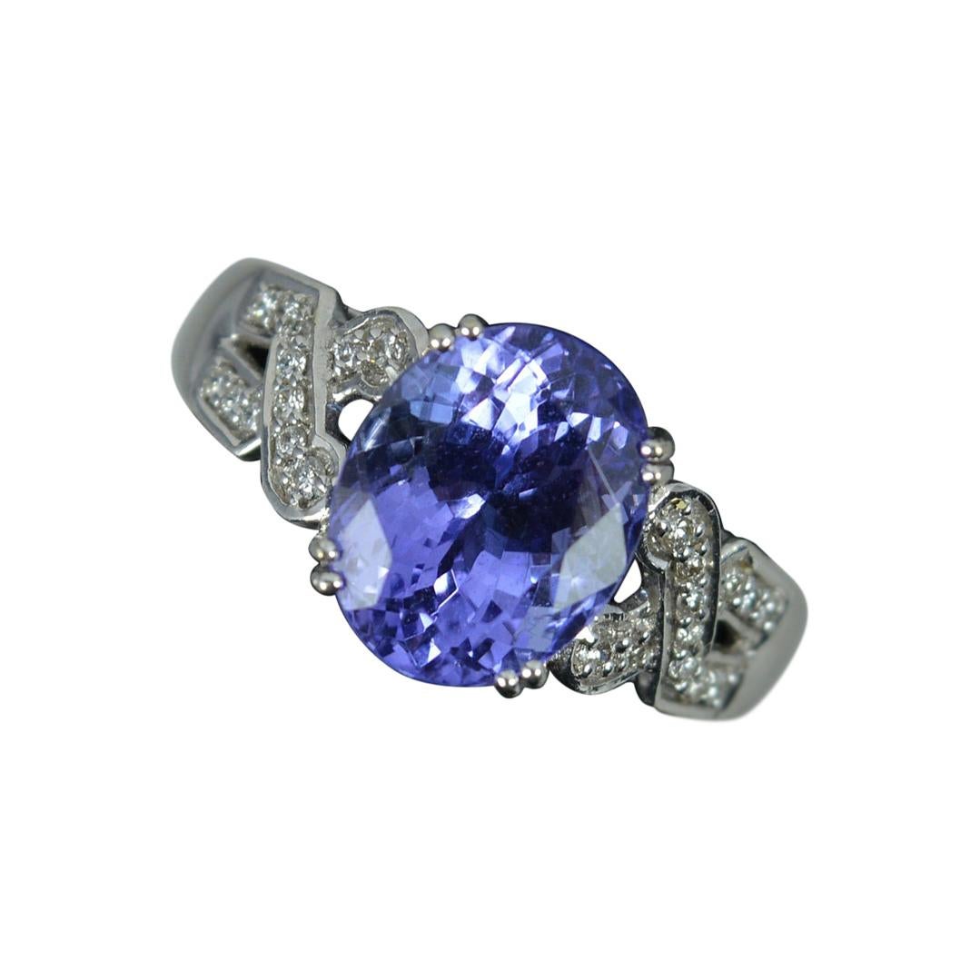 18ct White Gold Tanzanite and Diamond Engagement Cluster Ring