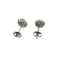 Pendientes de oro blanco de 18 quilates con tanzanita y halo de diamantes