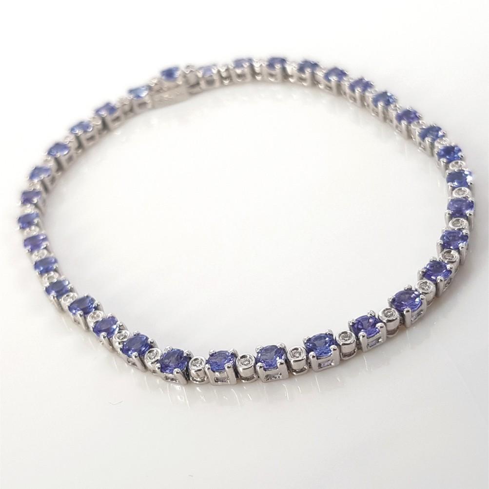 Taille ronde Bracelet tennis en or blanc 18 carats, tanzanite et diamants en vente