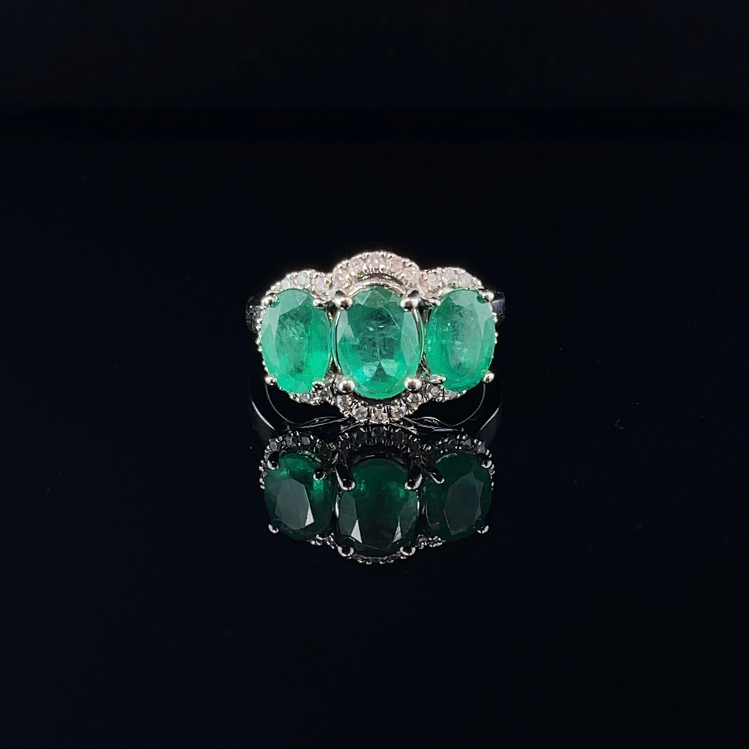 For Sale:  18ct White Gold Trilogy Emerald and Diamond Ring 6