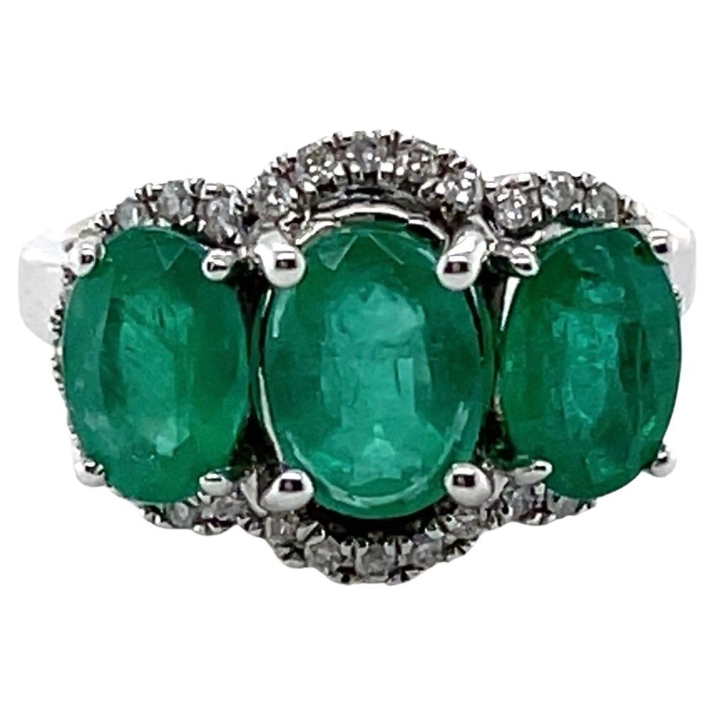 18ct White Gold Trilogy Emerald and Diamond Ring