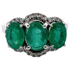 18ct White Gold Trilogy Emerald and Diamond Ring