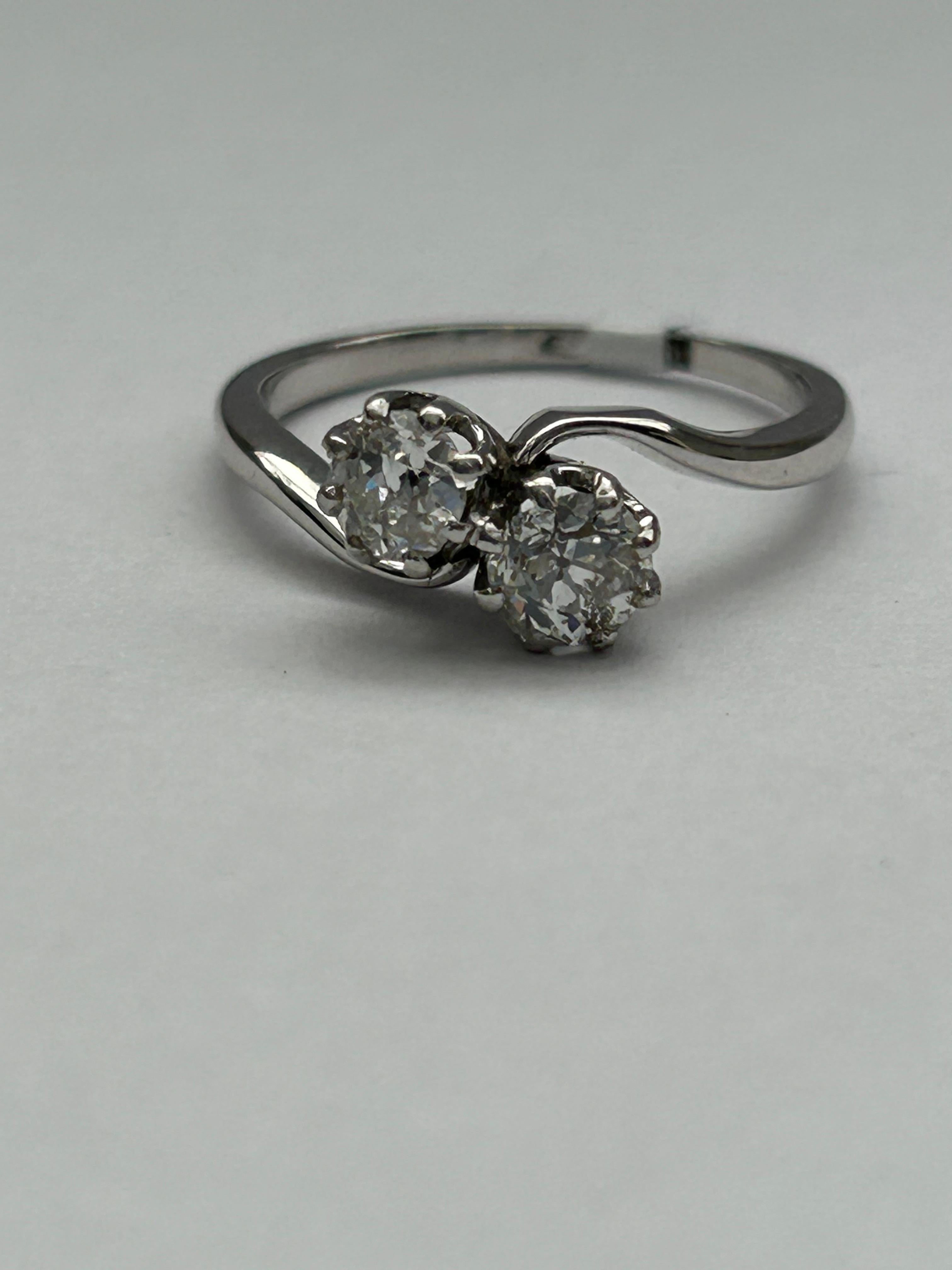 Women's or Men's 18ct White Gold Two Stone Ring. Est .60ct, clarity S/I1. Circa 1950's For Sale