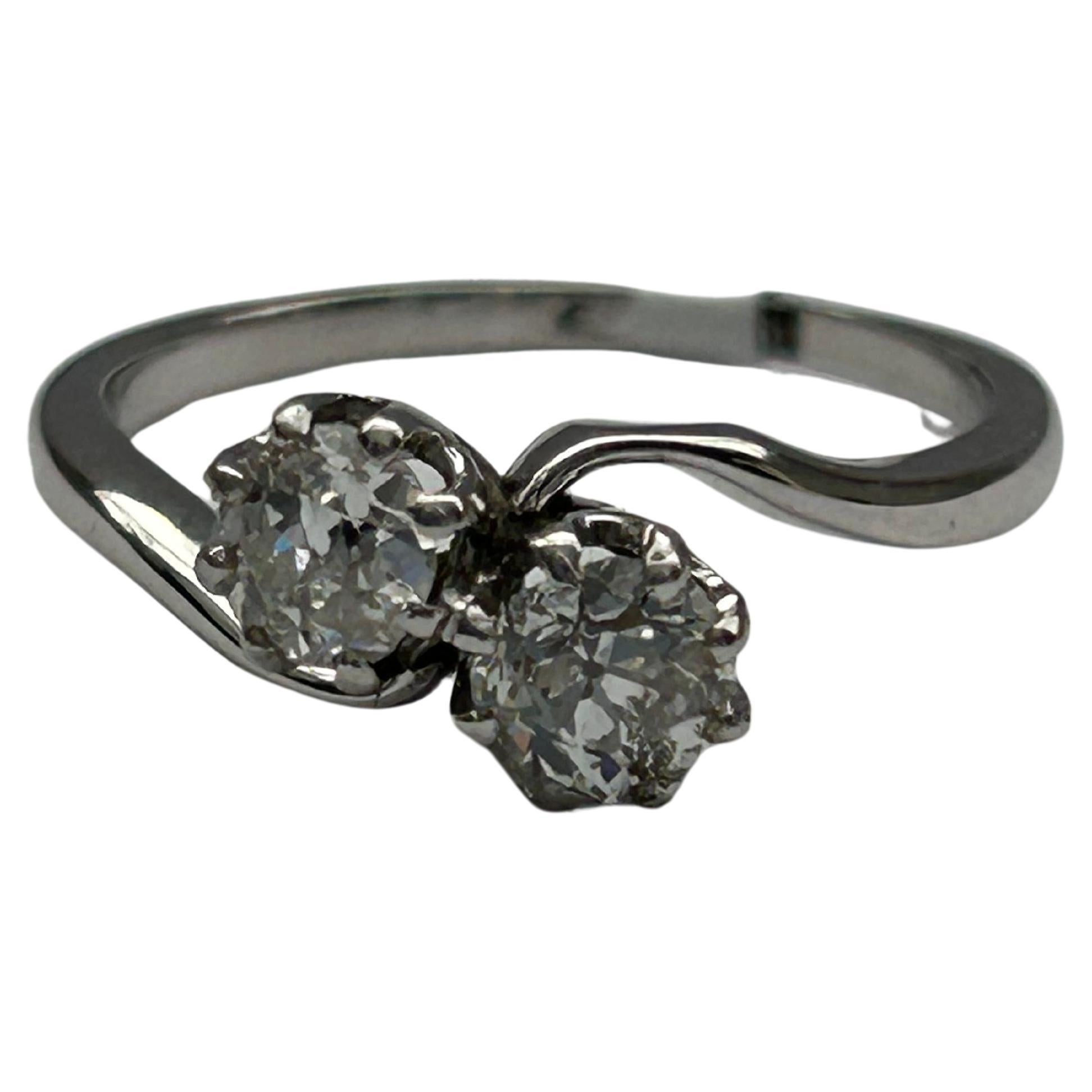 18ct White Gold Two Stone Ring. Est .60ct, clarity S/I1. Circa 1950's For Sale