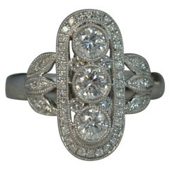 18 Carat White Gold and Vs Diamond Panel Cluster Ring