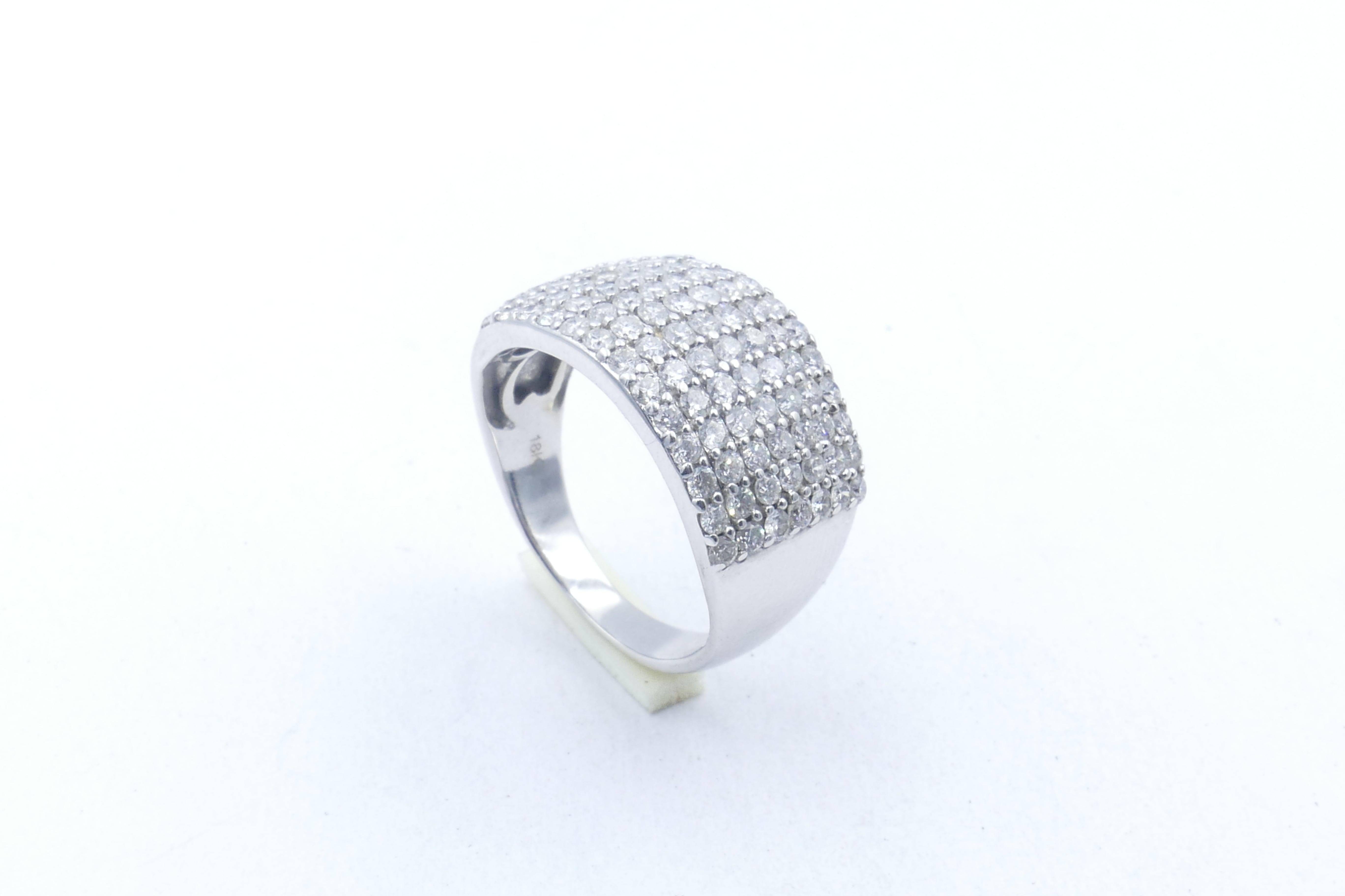 Traditional but SO smart!
Very wide multi band Ring consisting of 88 round brilliant cut Diamonds, good colour of G/I, Clarity SI1-SI2, & pave set.
The Band is polished, low half round, reverse tapered & measures 7.15mm at the base of the shank