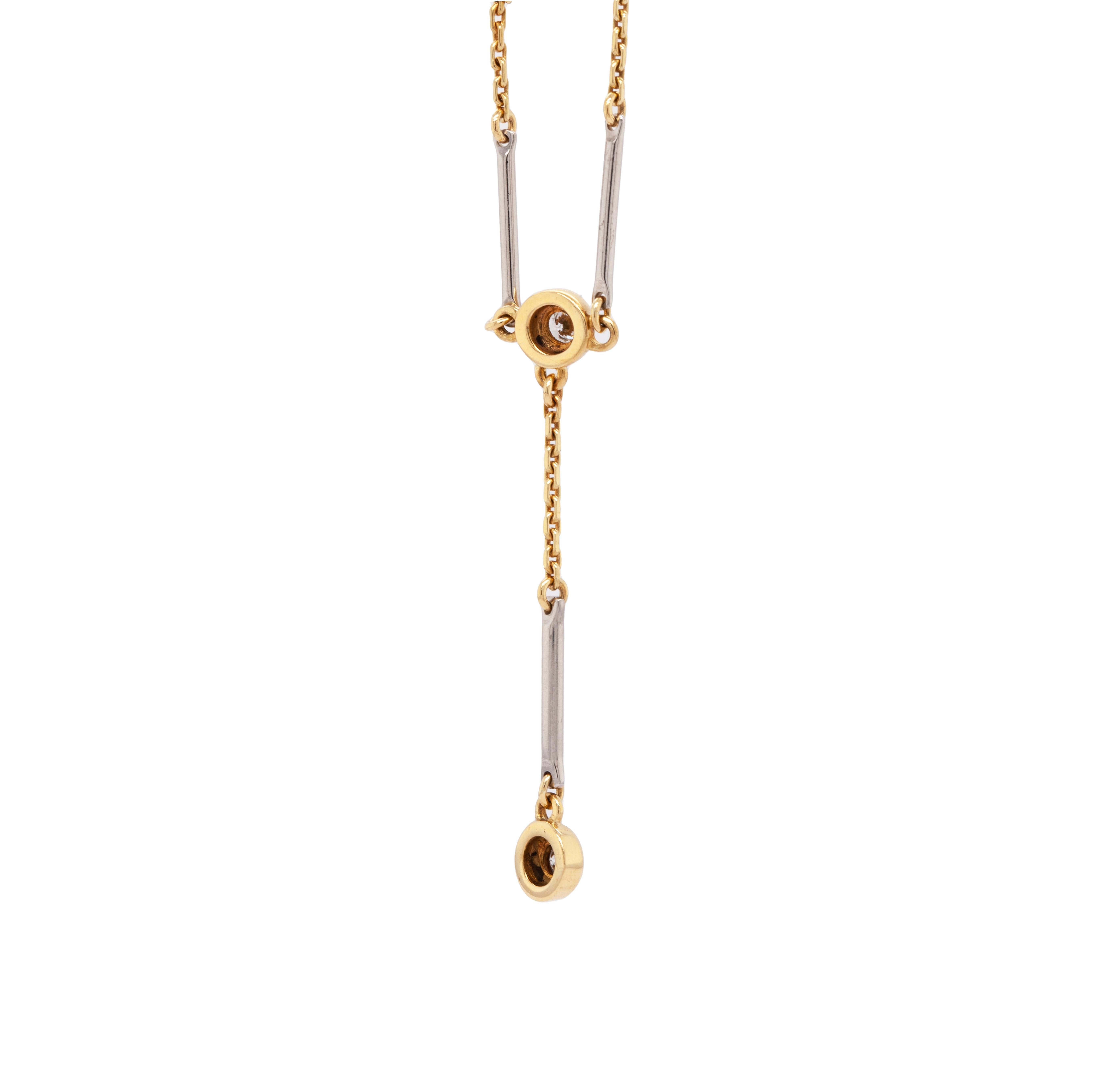 This is a really lovely piece of luxurious modern British jewellery. Crafted out of 18ct gold, it features a mixed-style chain, interspersing sections of yellow gold trace chain with white gold bars. Four stunning diamonds, totalling an estimated