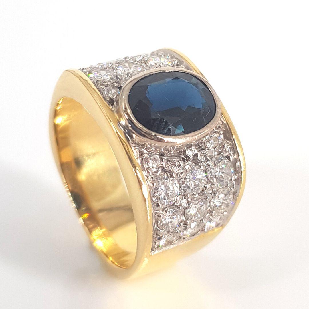Magnificent.

Item Attributes:

Metal Colour:                  White and yellow

Weight:                           11.5g       

Size:                                N ½ ( 7 )

Center Stone Attributes

Number of Stones:         1 x Sapphire

Cut:   