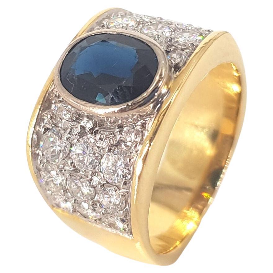 18 Carat Yellow and White Gold Sapphire and Diamond Ring For Sale