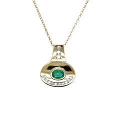 Colgante de esmeralda amarilla de 18 ct y diamante en cadena de 16