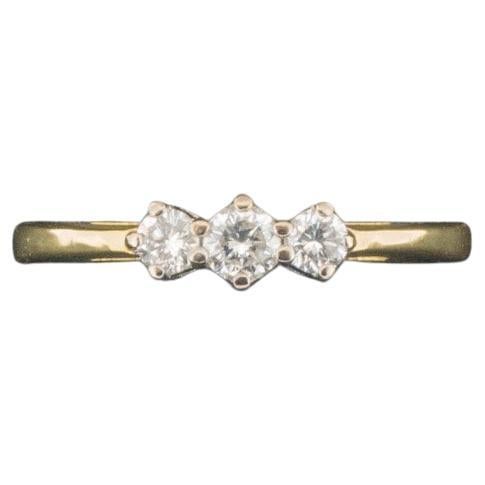 Condition: Pre-Owned with Mild/Light Scratches
Material: 18ct Yellow Gold 
Hallmarked: Yes
Main Stone Identity: Diamond (Stamped DIA)
Main Stone Total Carat Weight: 0.35ct (Stamped)
Item Weight: 3.6g
Size: UK O
Ring Band Width: 2.7mm 