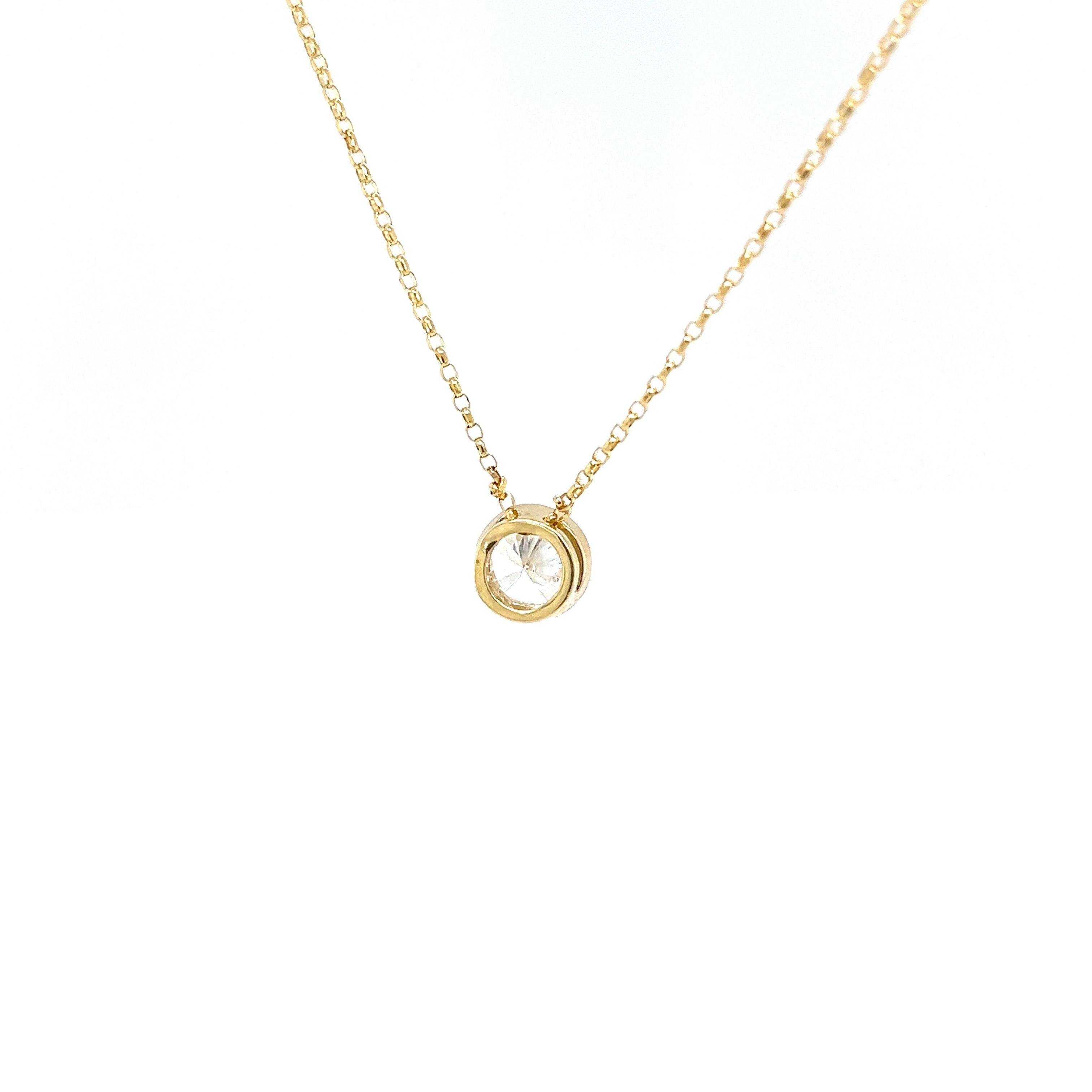Pendentif en or jaune 18ct avec un diamant de 0,94ct suspendu à une chaîne de 16