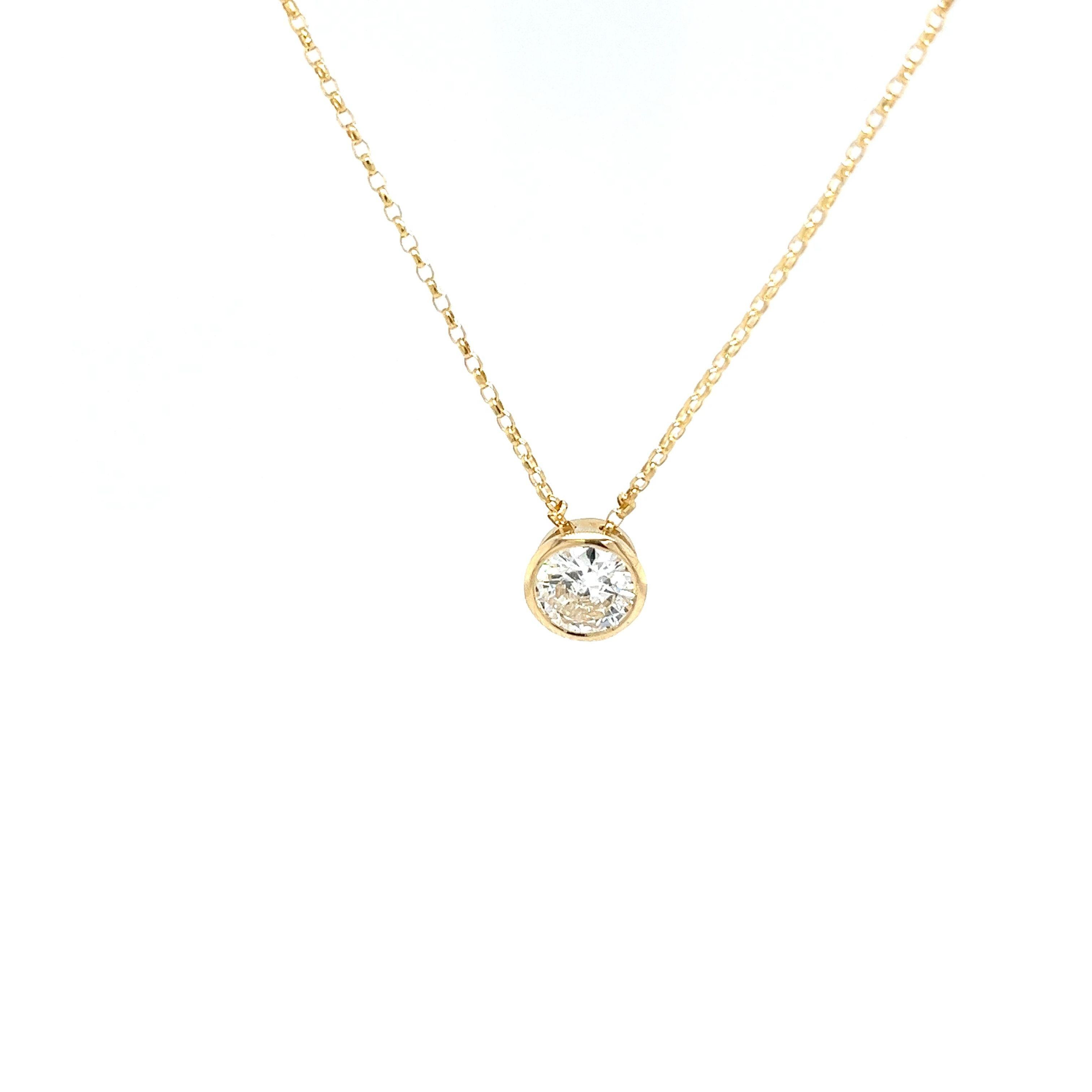Pendentif en or jaune 18ct avec un diamant de 0,94ct suspendu à une chaîne de 16