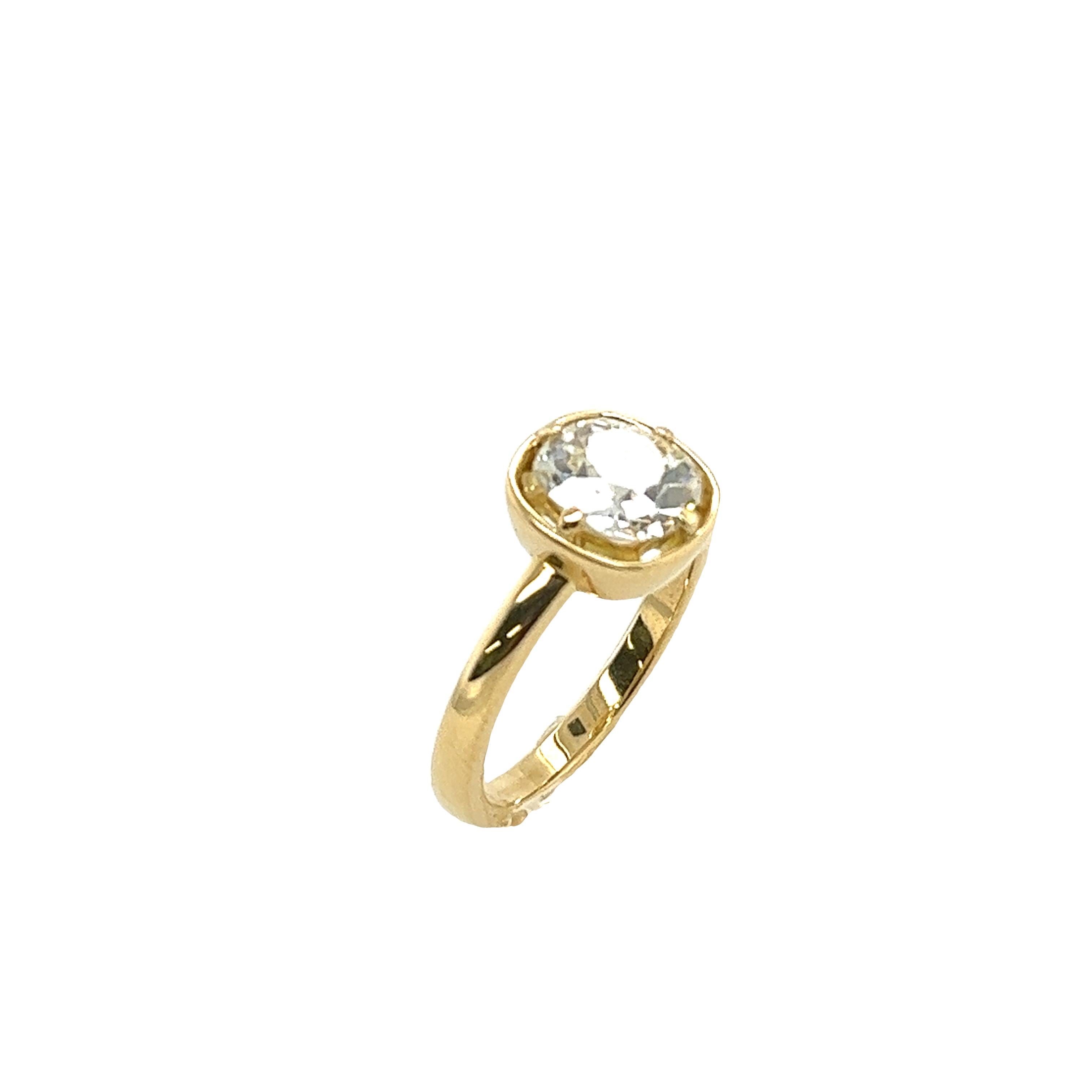 An elegant diamond ring for your engagement,  set with 1.71ct K colour and SI2 clarity old cut cushion diamond in 18ct yellow gold setting.
A beautiful and elegant choice for an engagement ring or a special occasion.

Total Diamond Weight: