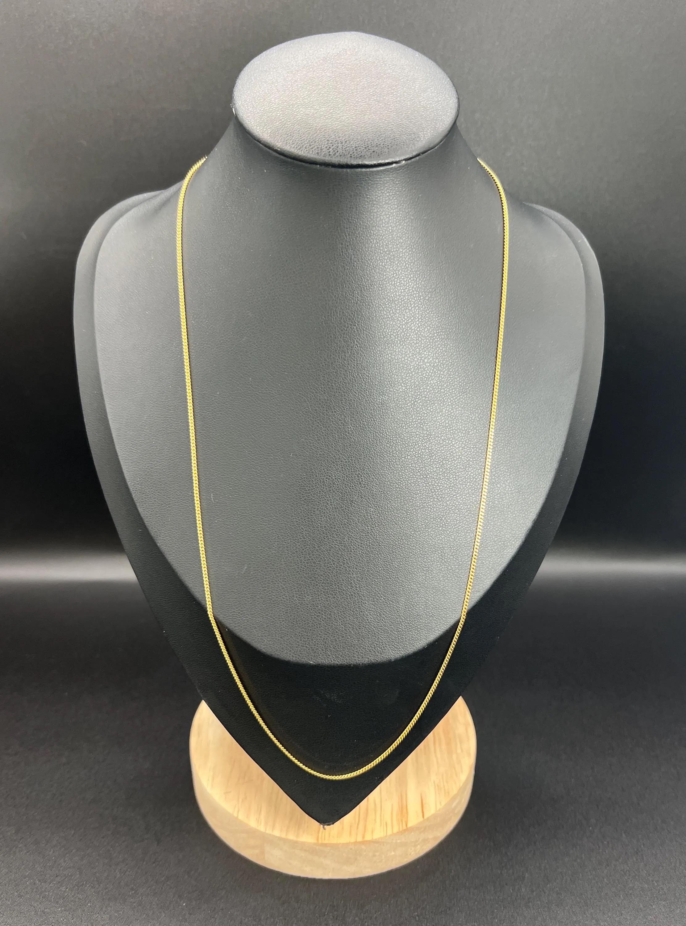 Antique Fine Curb Chain

18ct Yellow Gold

Circa 2000

This stunning curb link chain is crafted from 18ct yellow gold, which has been stamped for authenticity. The antique fine curb chain is beautifully designed, featuring intricate links that add
