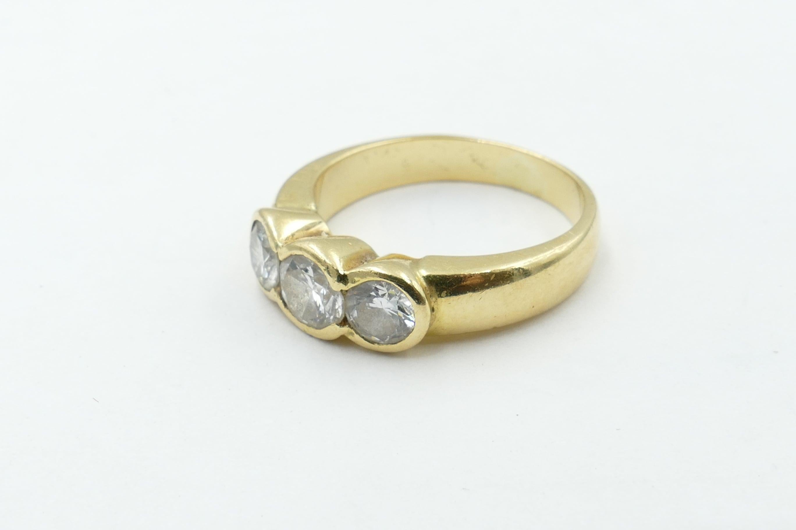 18 carat gold ring with 3 diamonds