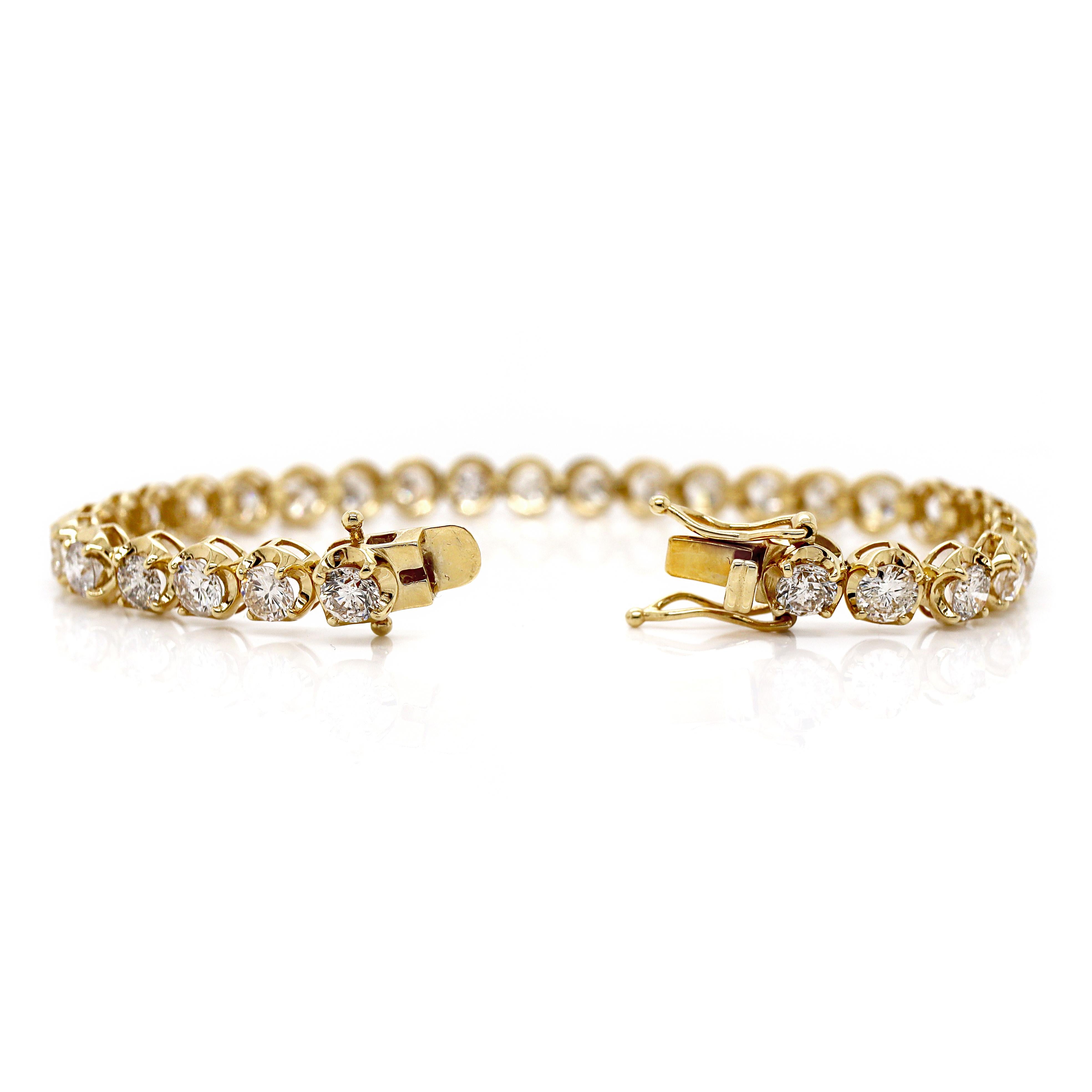 18CT Yellow Gold 8.00CT Diamond Tennis Bracelet

A diamond tennis bracelet is a timeless accessory, ideal for special occasions or everyday wear, embodying the perfect blend of luxury and practicality. Whether worn alone or stacked with other