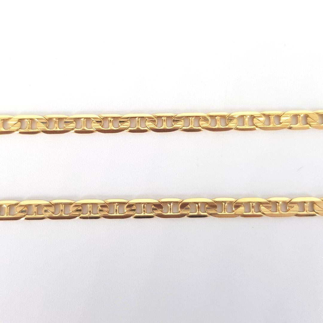 Attractive 
Chain Attributes: 
Weight:			18.9gram 
Metal Colour:		Yellow
Metal:			18ct
Length:                  	610mm
Width: 			4mm
Thickness:		1mm
