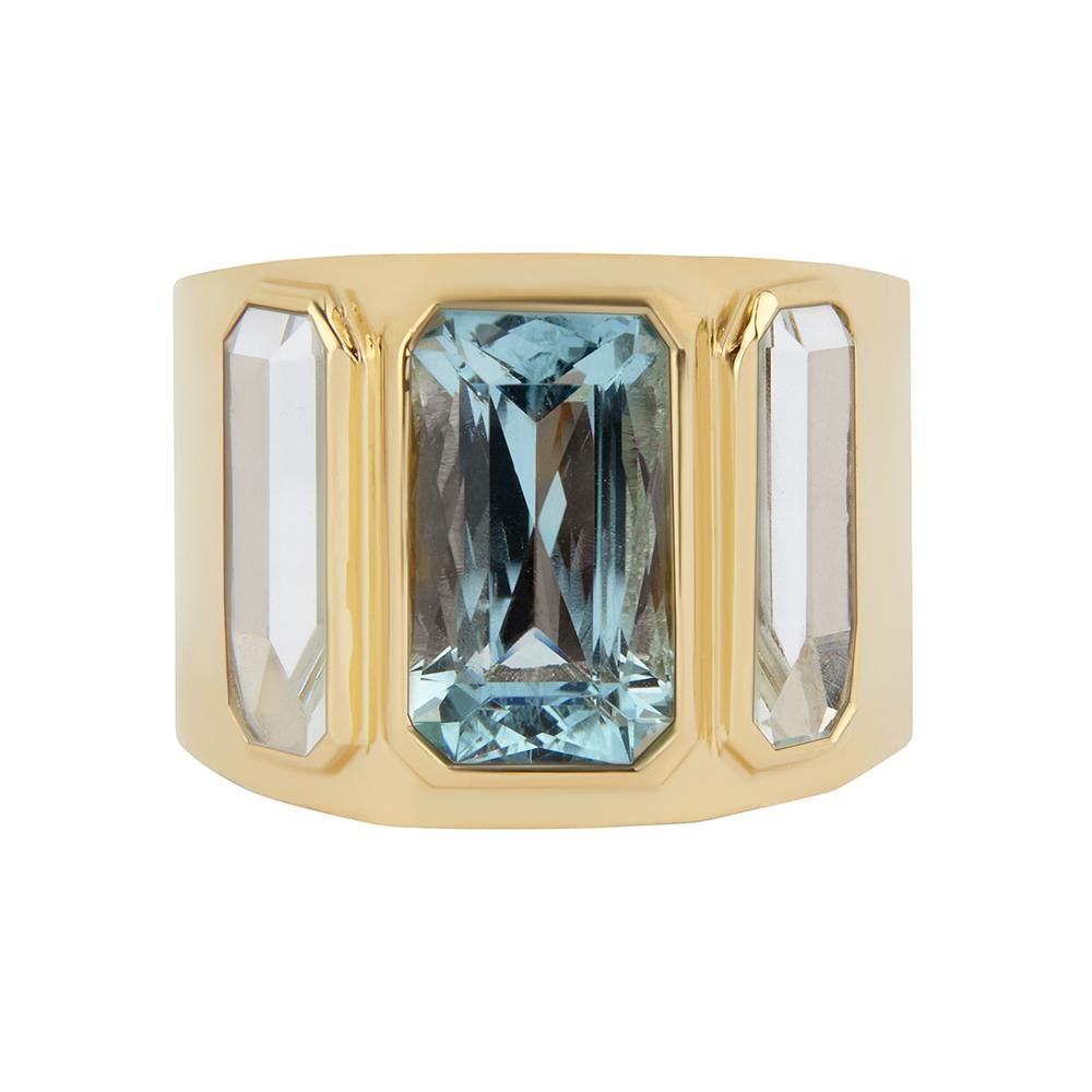 18ct yellow gold and aquamarine ring
One-of-a-kind
Hallmarked
UK Size O/P

Bold and beautiful, the Carmen Ring is a truly versatile cocktail ring. Set with three, custom-cut large Mozambique aquamarines, it is the perfect statement accessory for any