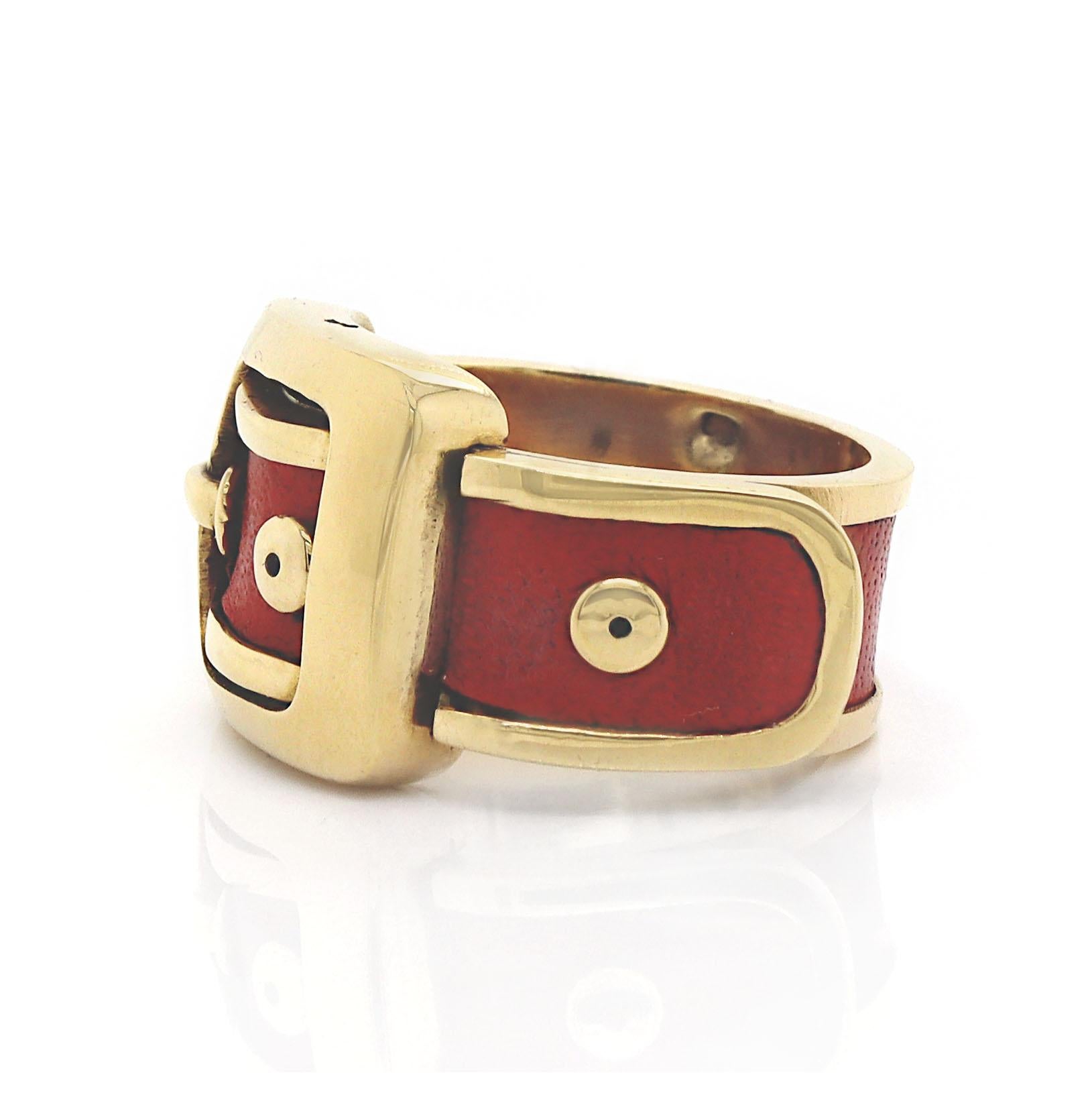 18CT Yellow Gold And Leather Vintage Buckle Ring

Proudly presenting this stunning 18ct yellow gold and leather buckle ring which is a striking fusion of luxury and rugged elegance. The warm, rich tones of the gold provide a sumptuous backdrop,
