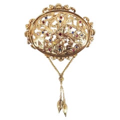 Broche ancienne en or jaune 18 carats