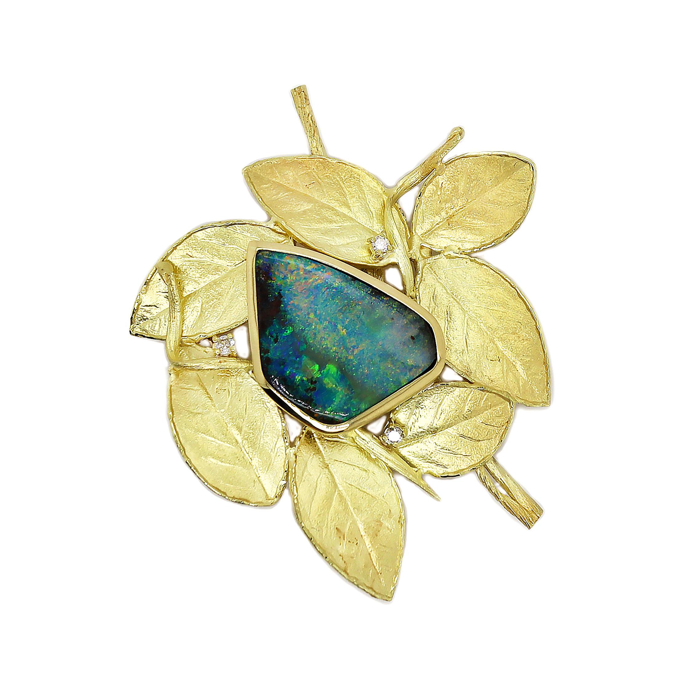18CT Yellow Gold Australian Opal & Diamond Leaf Brooch

Behold the epitome of natural beauty and elegance: our 18CT Yellow Gold Australian Opal and Diamond leaf brooch adorned with a resplendent Australian Boulder Opal and glistening Diamonds. This