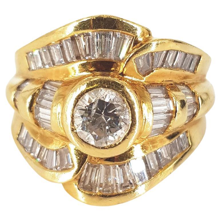 Bague habillée en or jaune 18 carats avec diamants taille baguette