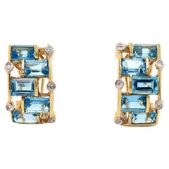 18 Karat Gelbgold Ohrringe mit blauem Topas und Diamanten