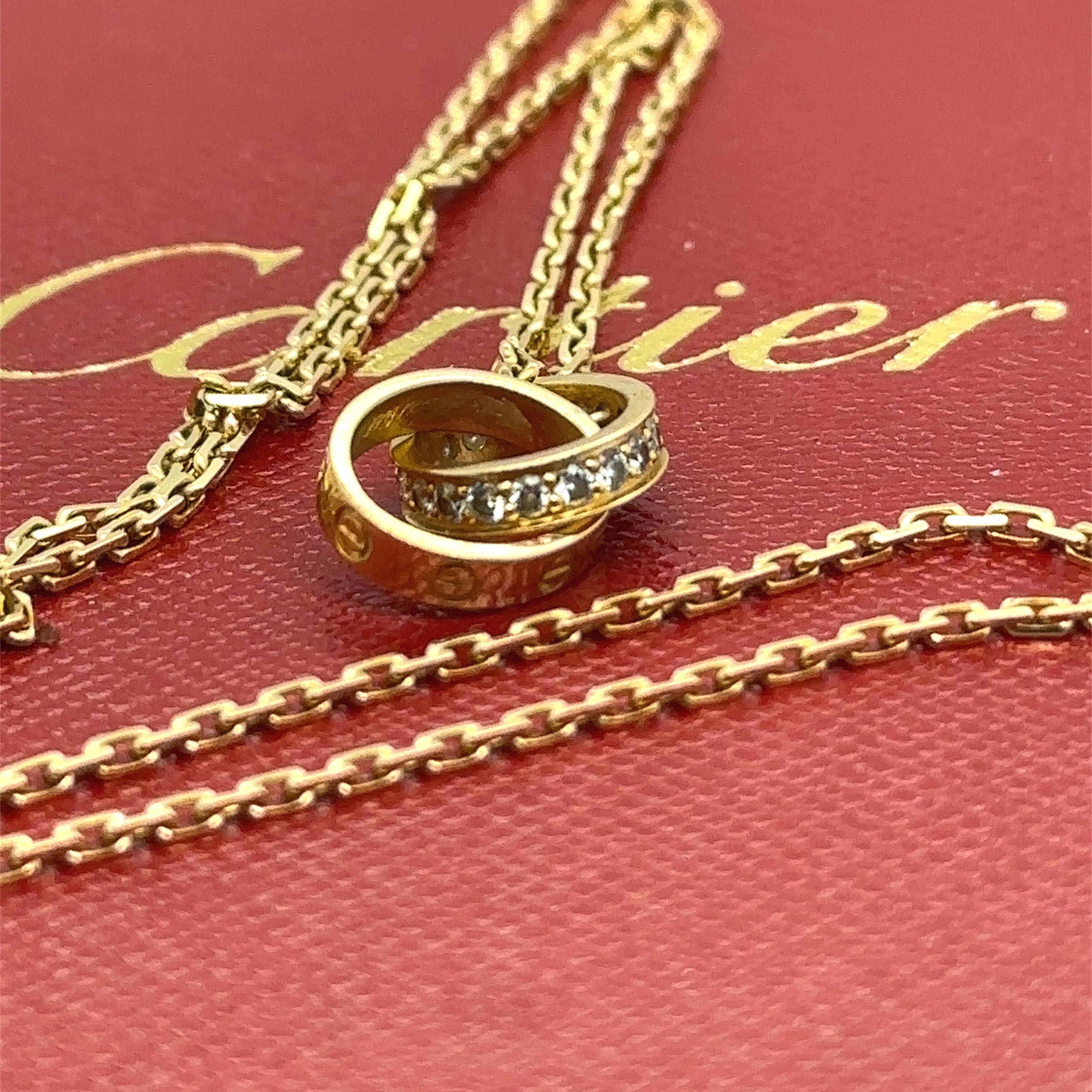 Collier en or jaune 18ct à diamants semi-pavés Cartier LOVE 0.22ct 6.58g en vente 3