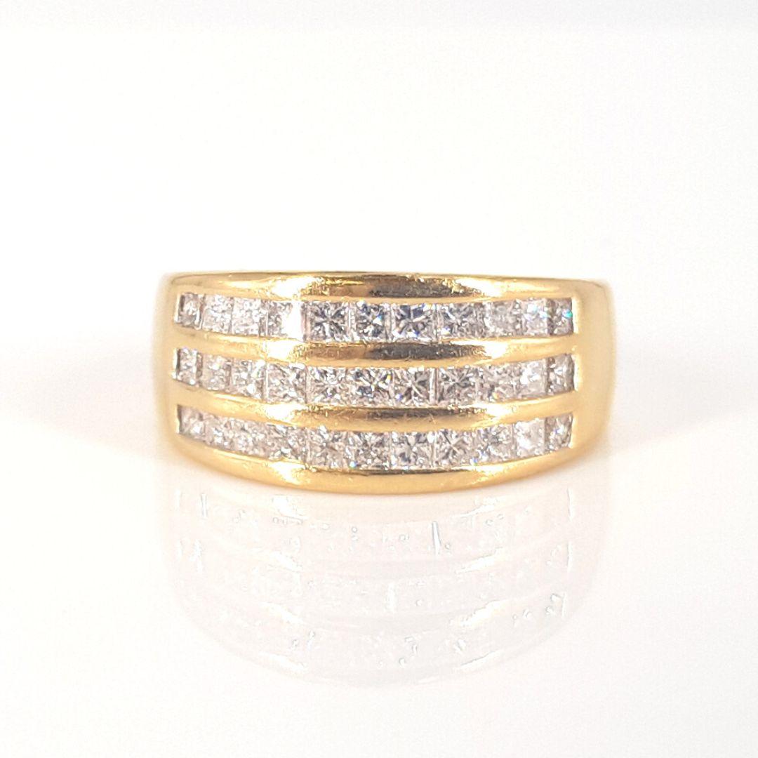 Princess Cut 18 Carat Yellow Gold Channel Set Diamond Ring For Sale