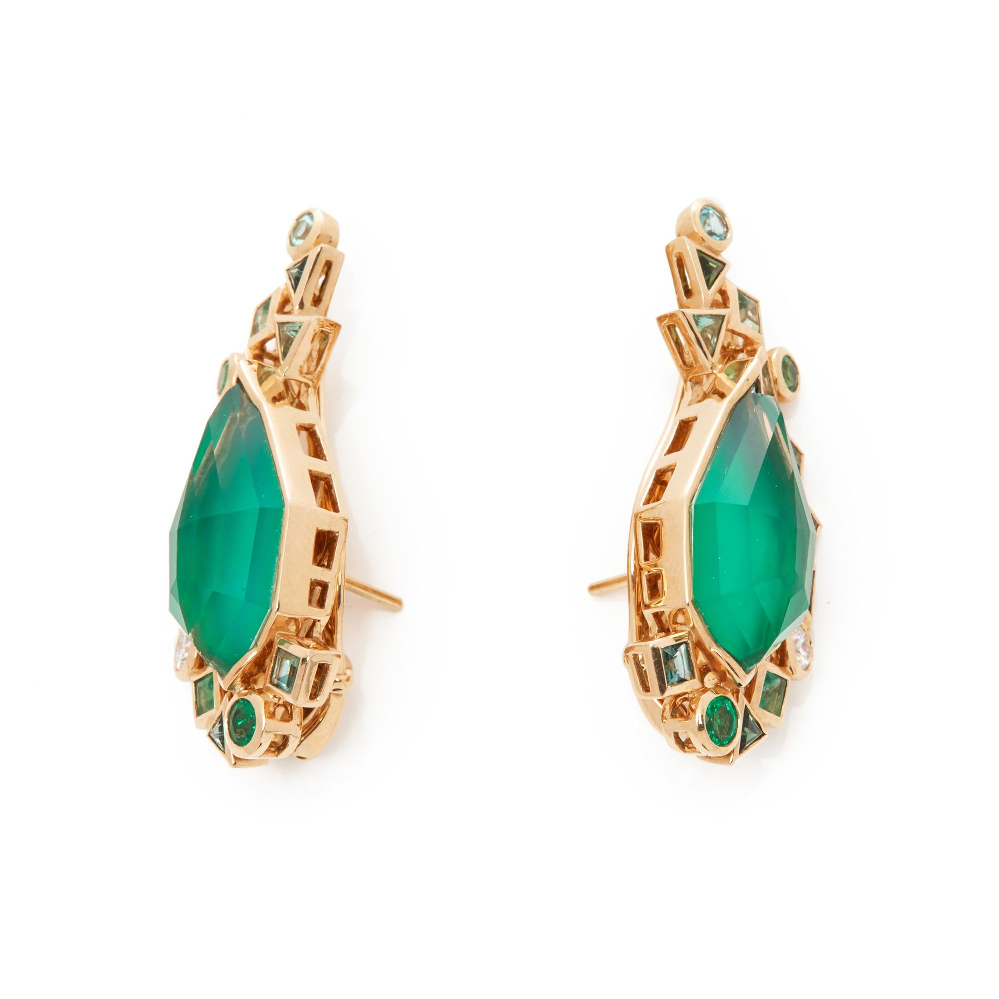 These Earrings by Stephen Webster are from his Crystal Haze Gold Struck Collection and features Two Green Agate set sections Surrounded with mixed cut Green Tourmaline and Round Brilliant Cut Diamonds. Set in 18k Yellow Gold. 