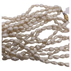 18ct Yellow gold cultured rice pearl bids necklace.