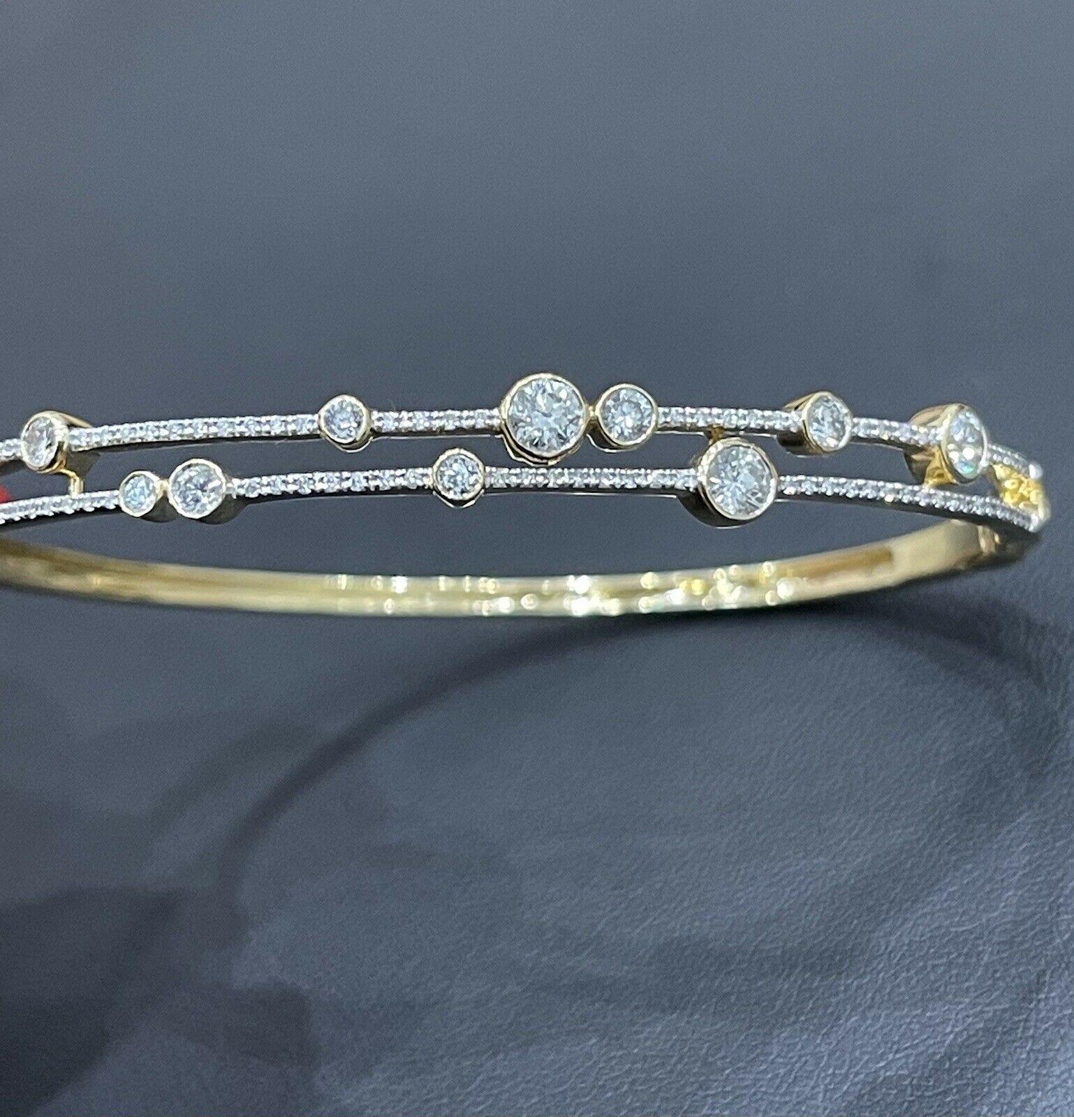 Fine high jewellery meets classic

Straight from heart of London Hatton Garden

Gorgeous bangle set in over 15g solid 18ct Gold with solitaire diamonds totalling 1ct

Hallmarked 750

Approx weight 16g

It will fit a wrist 6.5inch

SI1/VS