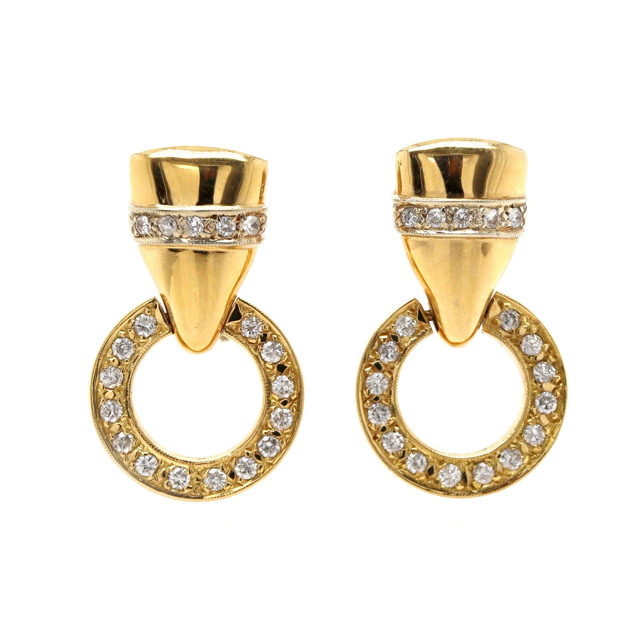 18ct Yellow Gold Diamond Door Knocker Earrings

These vintage 18ct yellow gold door knocker earrings exude timeless elegance and sophistication. The diamonds sparkle brilliantly against the warm gold, while the post back with butterfly clasps