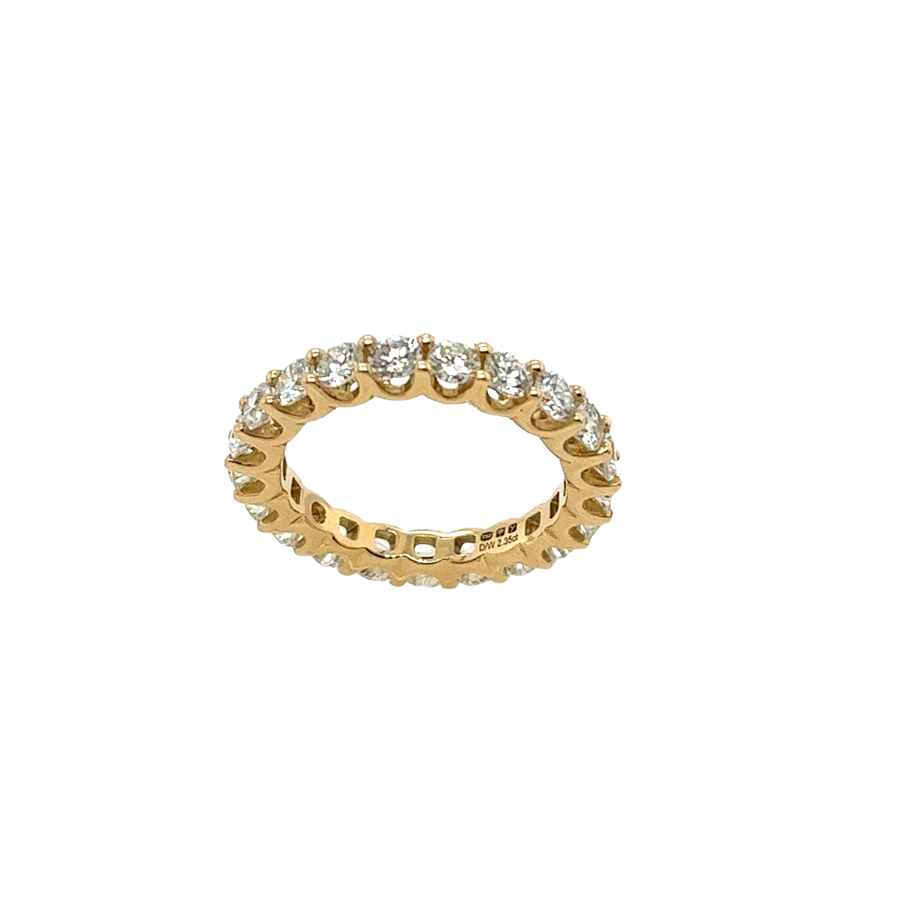 This stunning fine quality 18ct yellow gold
diamond full eternity ring set with 2.35ct G/VS1
 – a masterpiece that radiates elegance and everlasting allure.
Crafted with the utmost precision and passion, 
this mesmerizing eternity ring embodies the