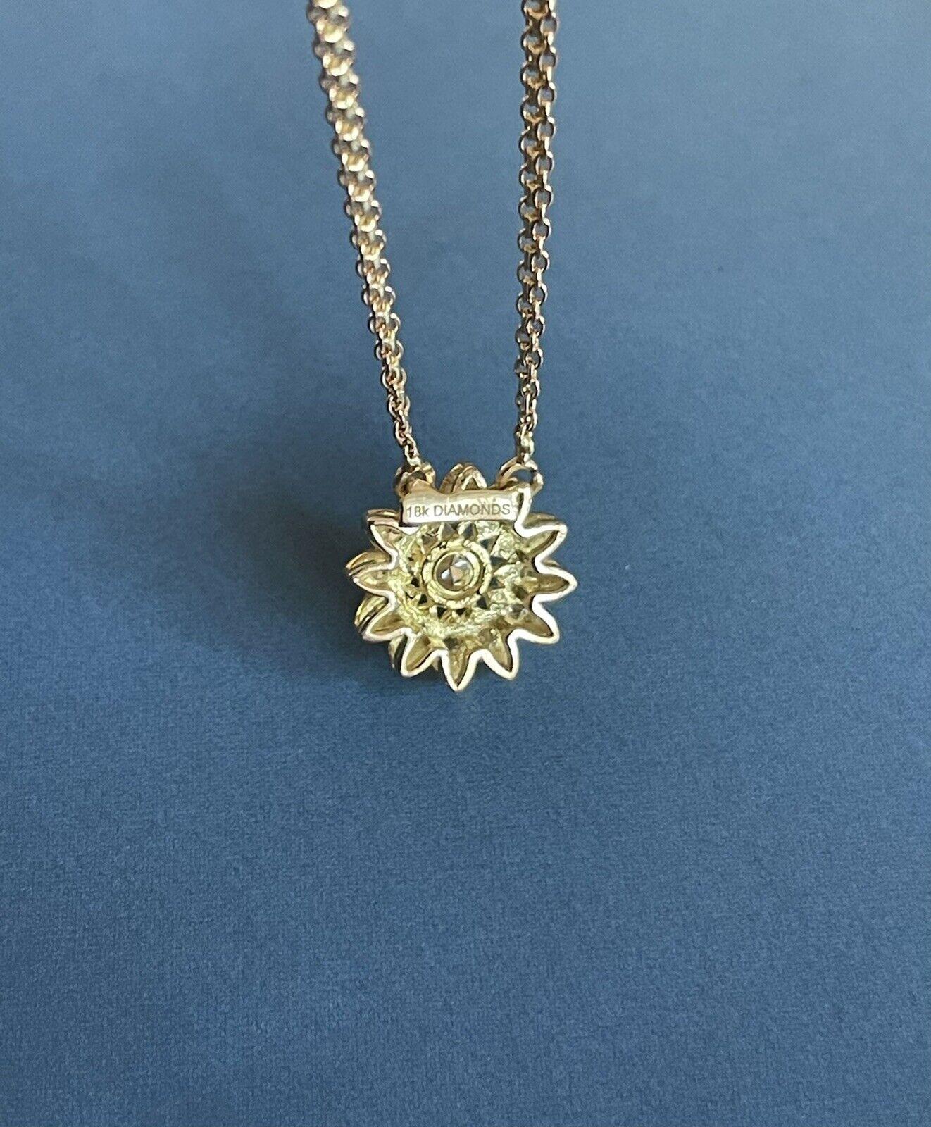 Our Handmade 18ct Gold & Diamond jewellery collection piece straight from heart of London Hatton garden

0.60ct flower pendant set with 4 smaller diamonds 0.05 each in special woven style chain

G/H colour

SI clarity

Chain 18 inches in