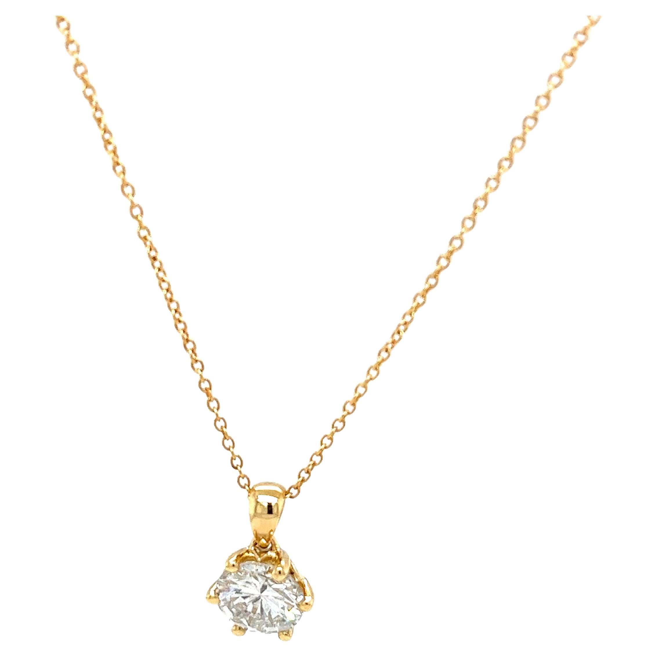 The necklace 18ct yellow gold chain is designed to hold 
the pendant at the center of the chest,
set with 1 round brilliant cut diamond 1.26ct F/SI3 EDR certified
making it a very elegant and beautiful piece of jewellery. 
Total Diamond Weight: