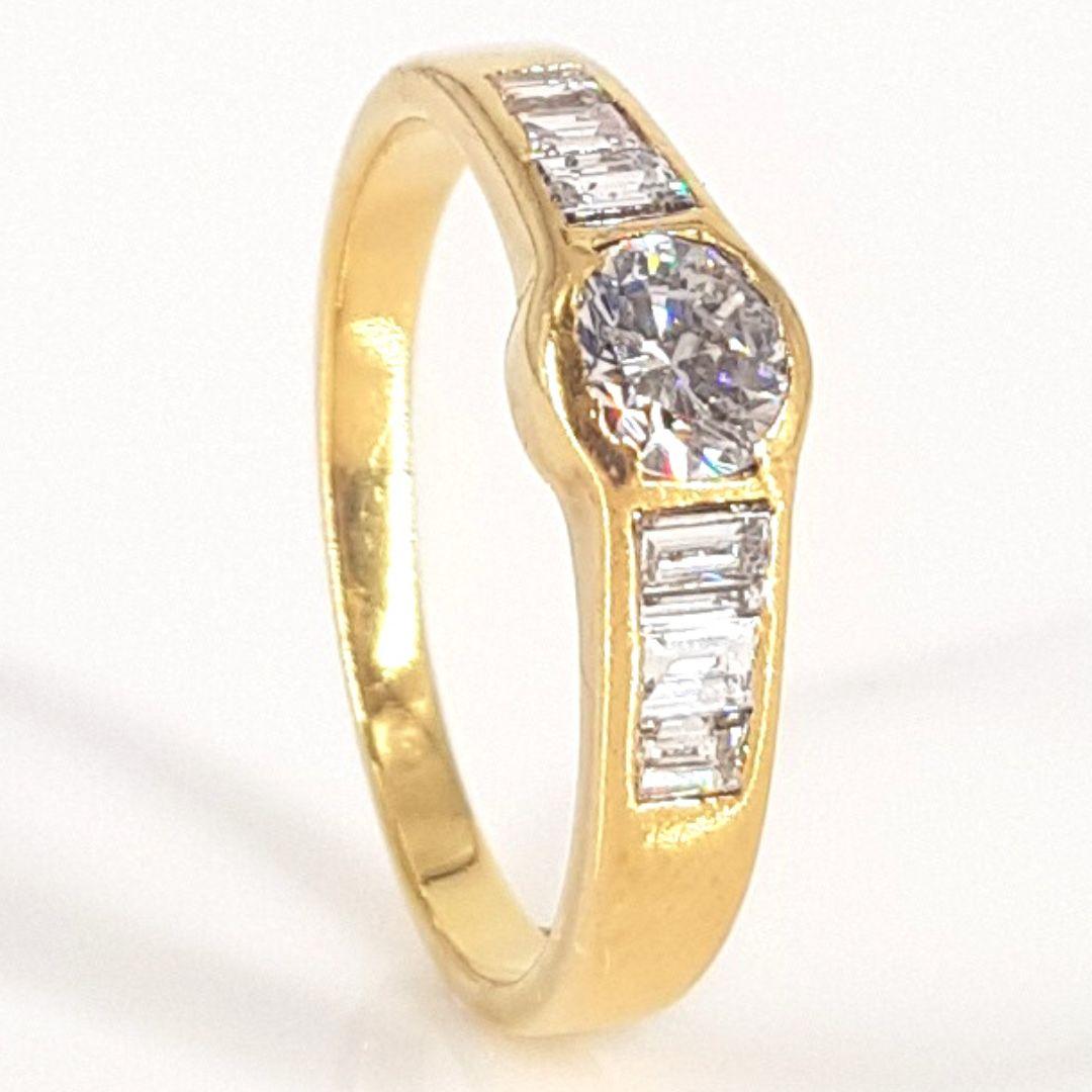 Gorgeous
Item Attributes:
Metal Colour:                Yellow
Weight:                           3.6g	
Size:                                 P ½  
Center Stone Attributes
Number of Stones:        1 Diamond
Cut:                                   Round