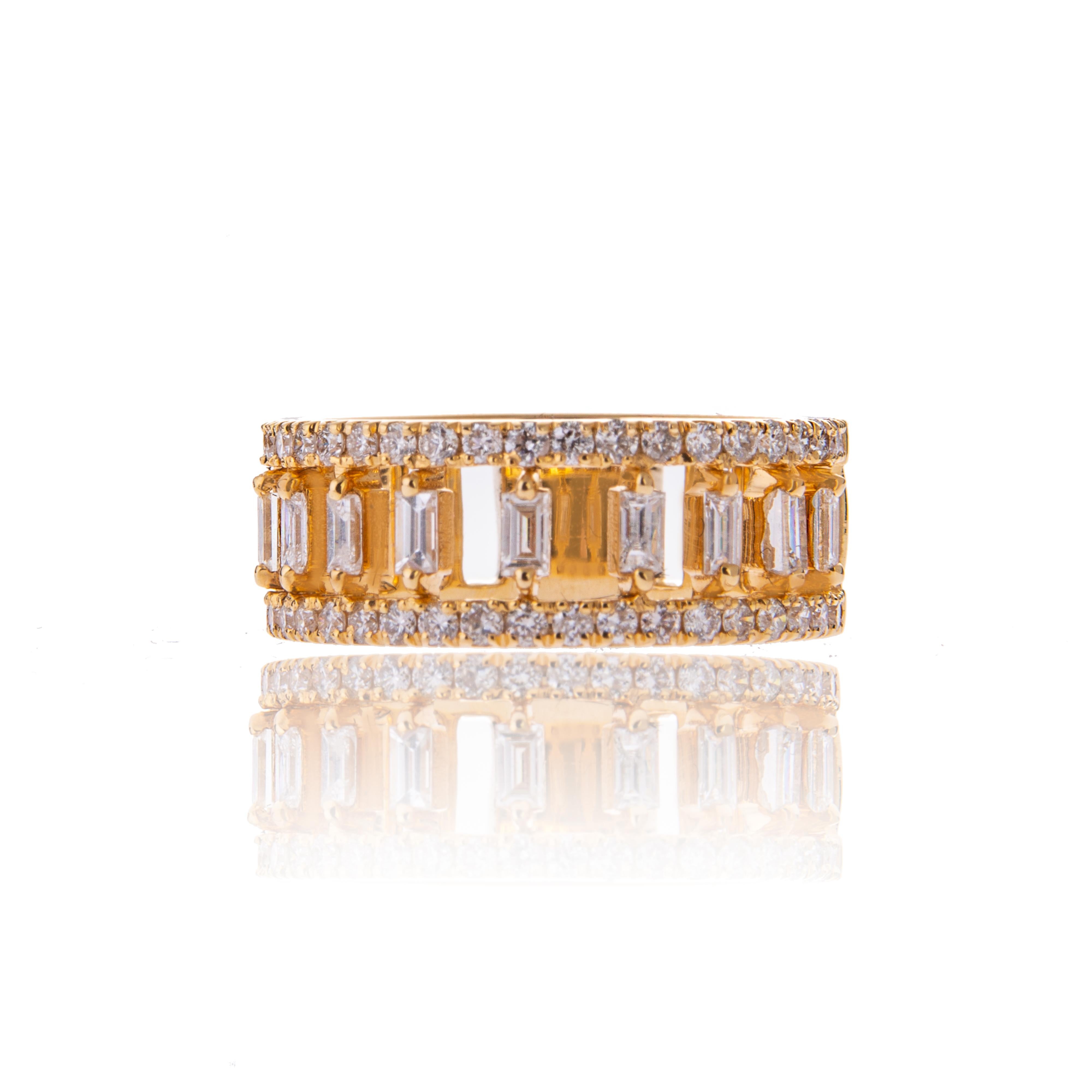 A classic diamond ring  surrounded by round and baguette sparkling diamonds set in 18ct yellow gold

Diamond: 0.75ct

Colour and Clarity: F SI

Metal Purity: 18ct yellow gold

British Hallmarked
This ring is currently availlable in size H UK  but