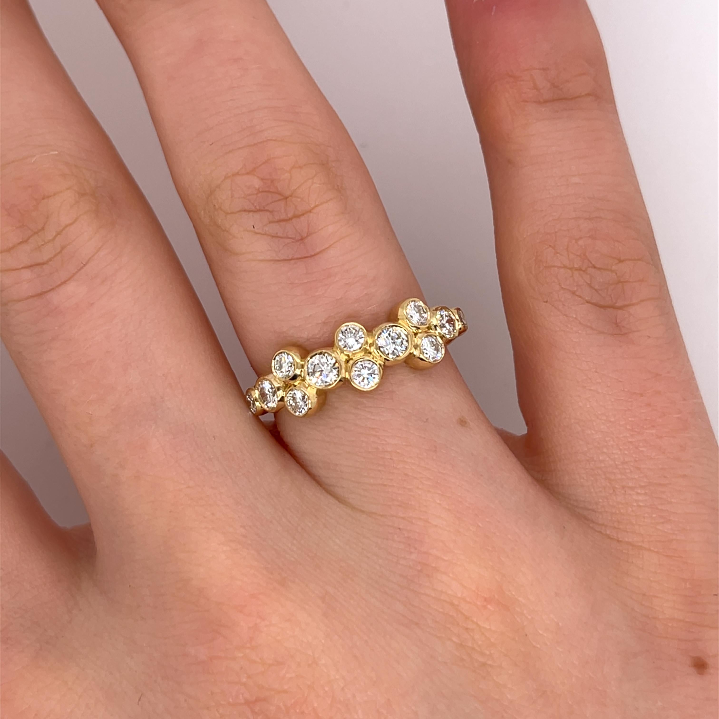 A stunning diamond ring crafted in 18ct yellow gold, 
featuring 12 natural diamonds for a brilliant sparkle. 
This elegant piece is perfect for engagements, 
anniversaries, or as a timeless addition to any jewellery collection.

Total Diamond