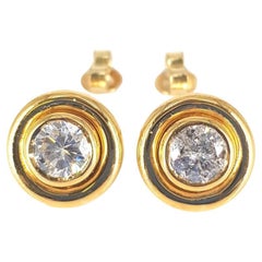 Borchie con diamante in oro giallo 18ct