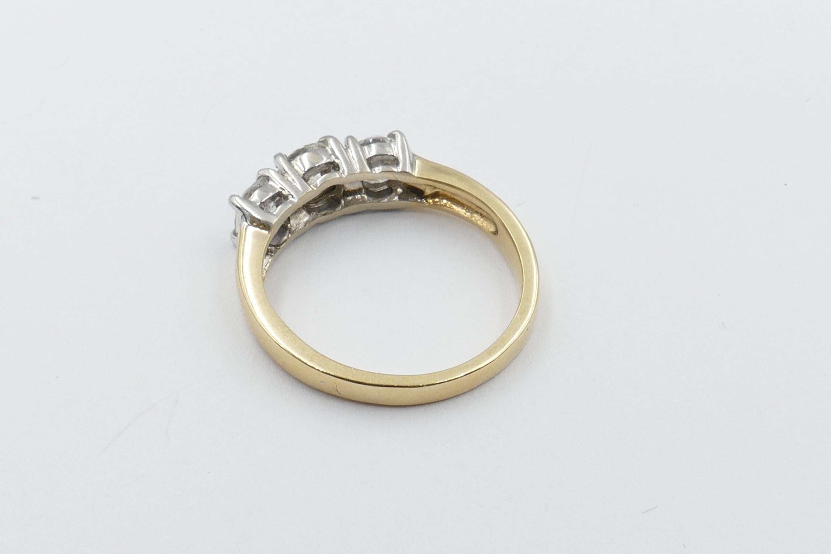 Modern 18 Carat Yellow Gold Diamond Trilogy Ring For Sale