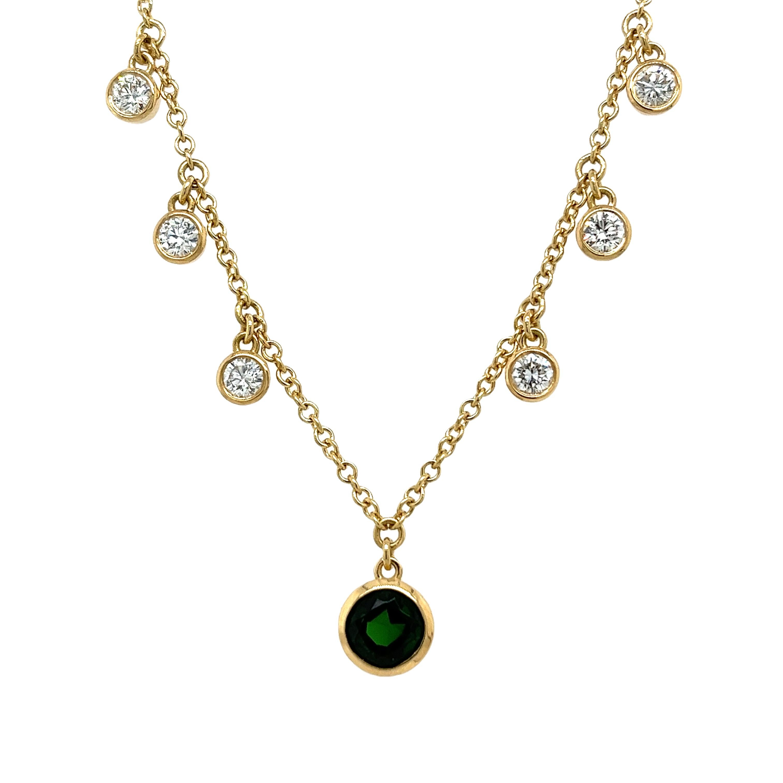 A true embodiment of elegance and sophistication.
This captivating piece showcases a stunning 1.07ct natural Tsavorite and Diamond necklace set with 6 dazzling round brilliant cut Diamonds, with a total Diamond weight of 0.85ct G/H VS1 in 18ct