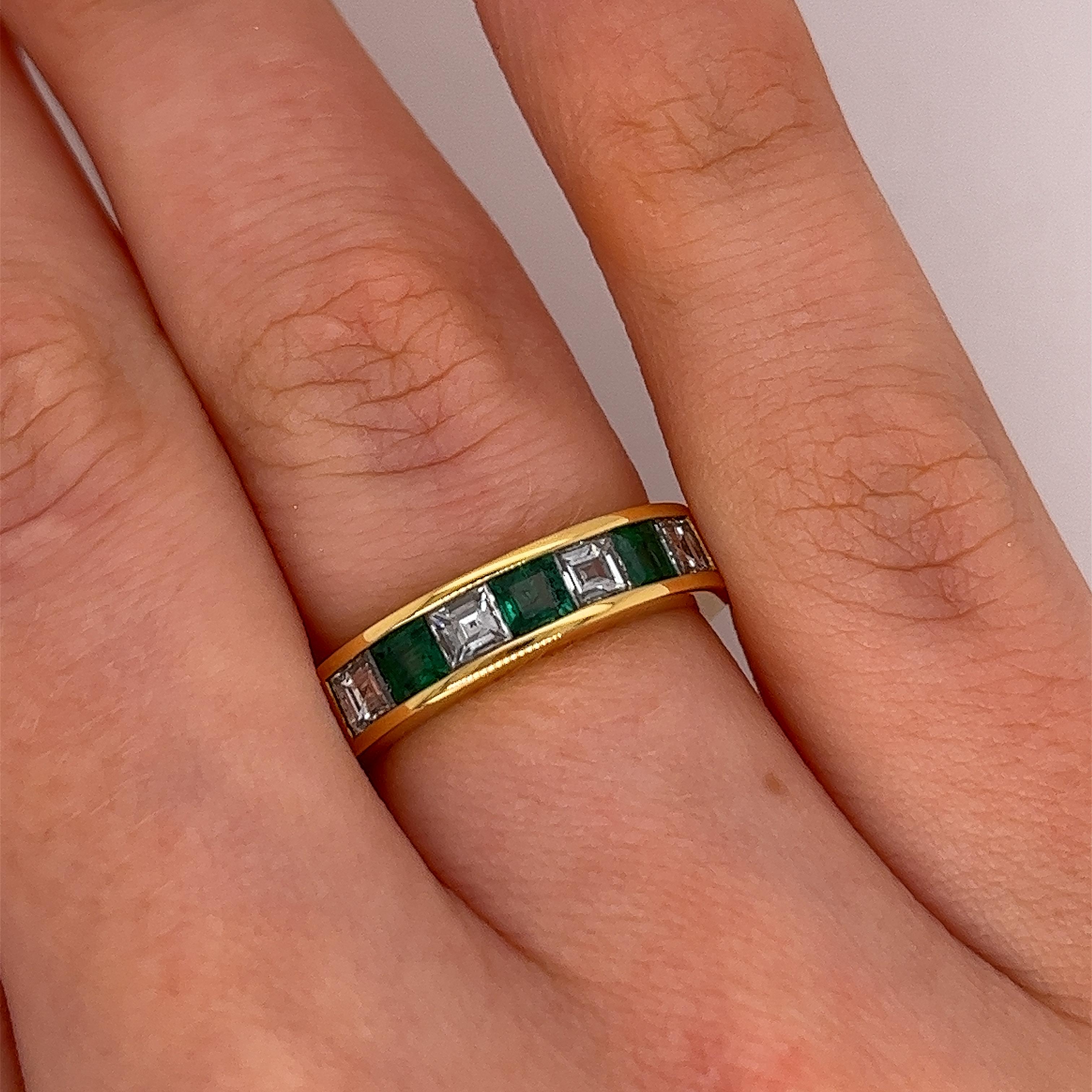 This diamond half eternity channel set band is set with 4 square diamonds and 3 square emeralds, 0.67ct princess cut diamonds and 0.52 emeralds set in 18ct yellow gold.
This ring is elegant and beautiful for a wedding ring or anniversary