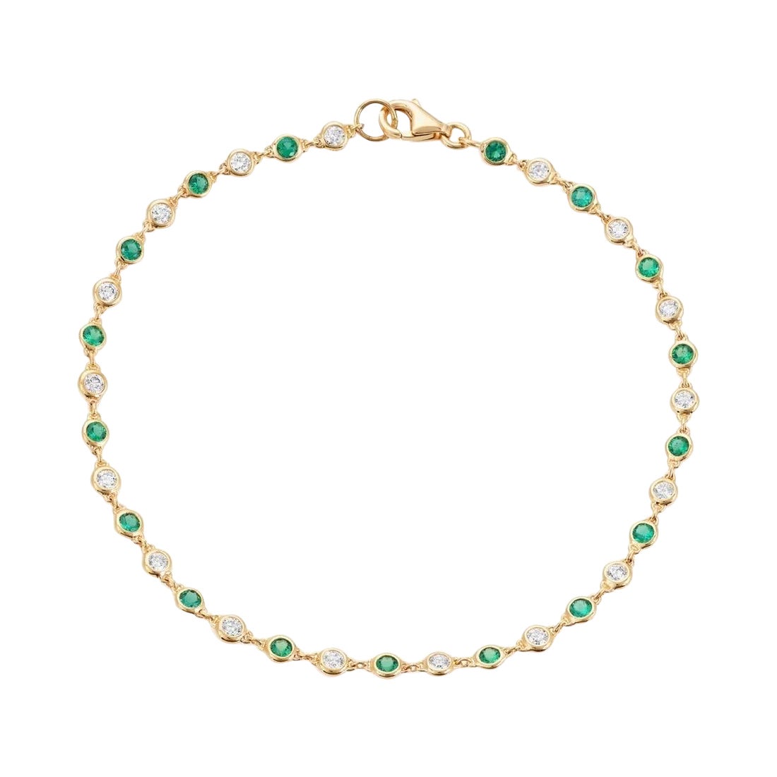 Bracciale a catena con smeraldi e diamanti in oro giallo 18ct in vendita