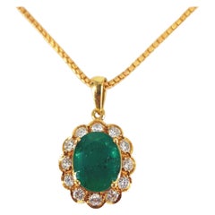 18ct Yellow Gold Emerald
Diamond Cluster Pendant on a 19ct Box Link Chain 18ct Yellow Gold Emerald
Diamond Cluster Pendant on a 19ct Box Link Chain