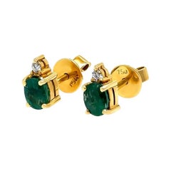 Boucles d'oreilles en or jaune 18ct émeraude et diamant 1.06ct 2.41g