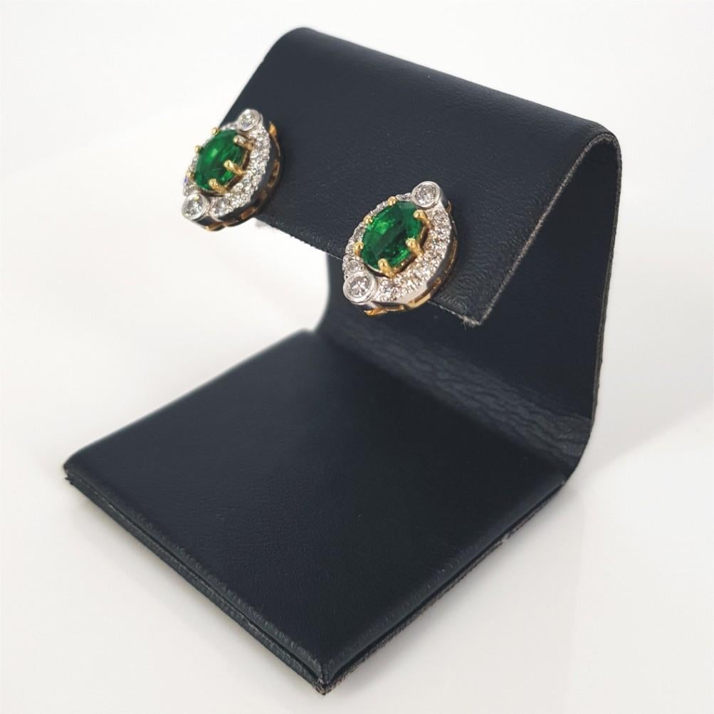 Oval Cut 18ct Yellow Gold Emerald & Diamond Studs  For Sale